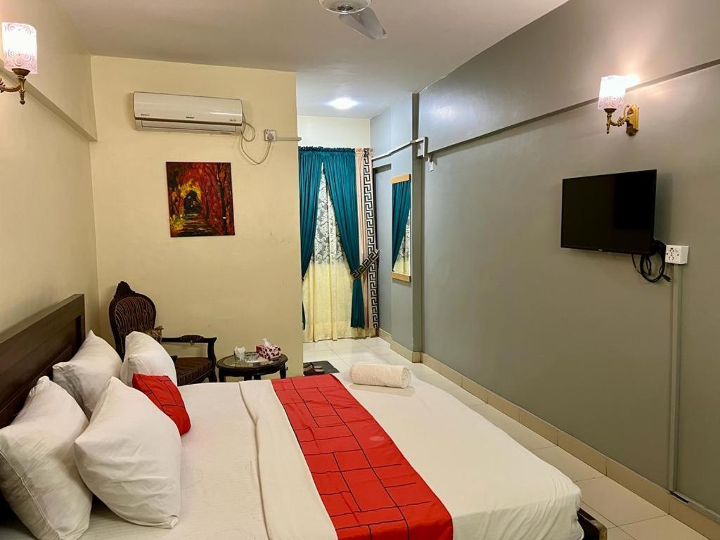 Hotel Rooms Dha Karachi Exterior photo
